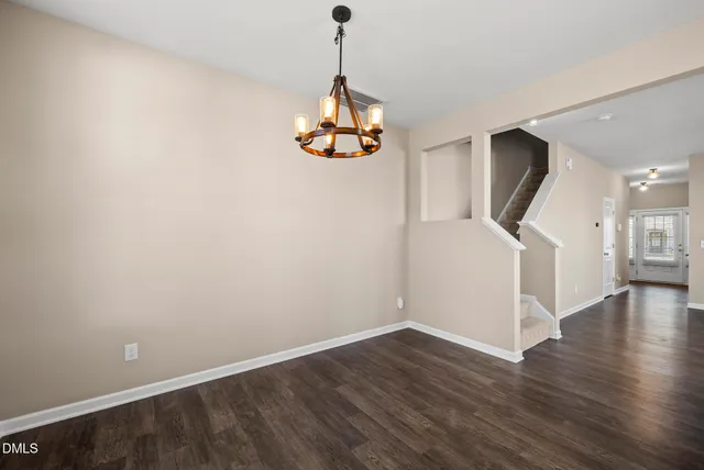 a view of empty room with windows