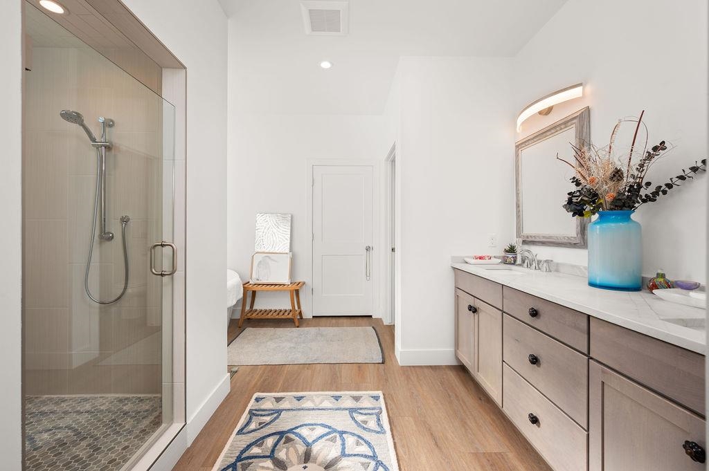 3644 G G 7/10 Road Palisade, CO 81526 - Photo 11 of 42 a spacious bathroom with a double vanity sink a mirror and shower