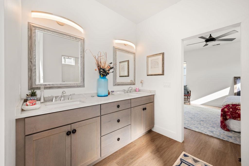 3644 G G 7/10 Road Palisade, CO 81526 - Photo 13 of 42 a bathroom with a granite countertop sink mirror and vanity