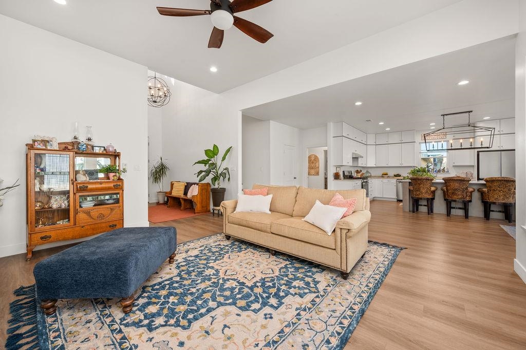 3644 G G 7/10 Road Palisade, CO 81526 - Photo 17 of 42 a living room with furniture and kitchen view