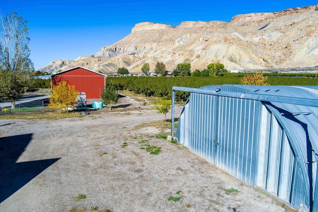 3644 G G 7/10 Road Palisade, CO 81526 - Photo 24 of 42 a view of a terrace with a bench