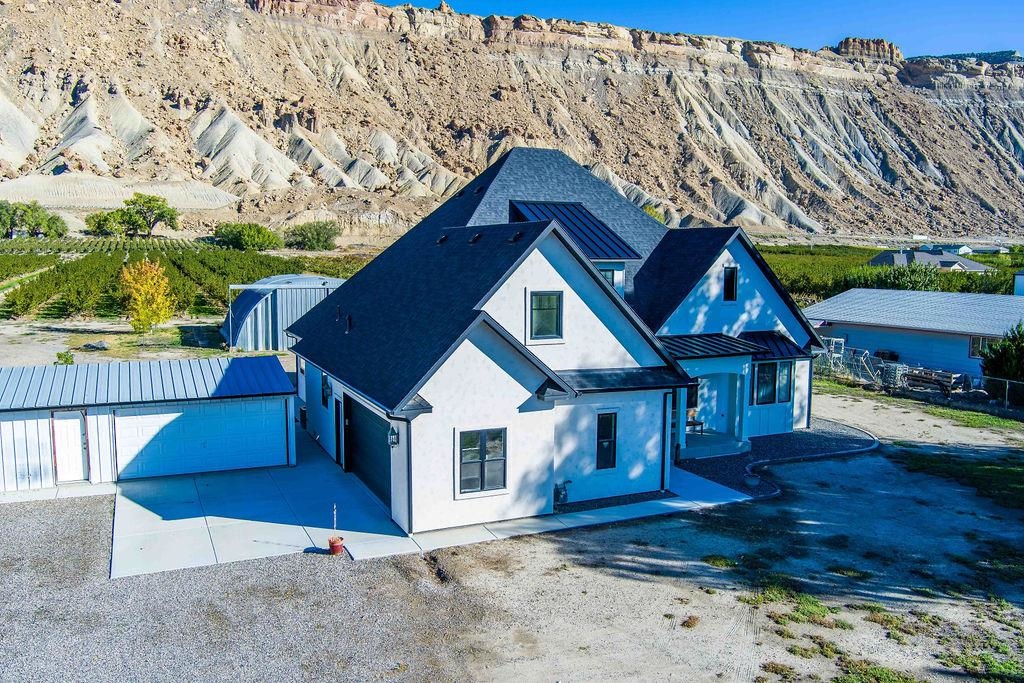 3644 G G 7/10 Road Palisade, CO 81526 - Photo 26 of 42 a view of a house with a yard