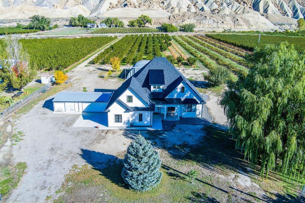 3644 G G 7/10 Road Palisade, CO 81526 - Photo 27 of 42 a view of a house with a yard