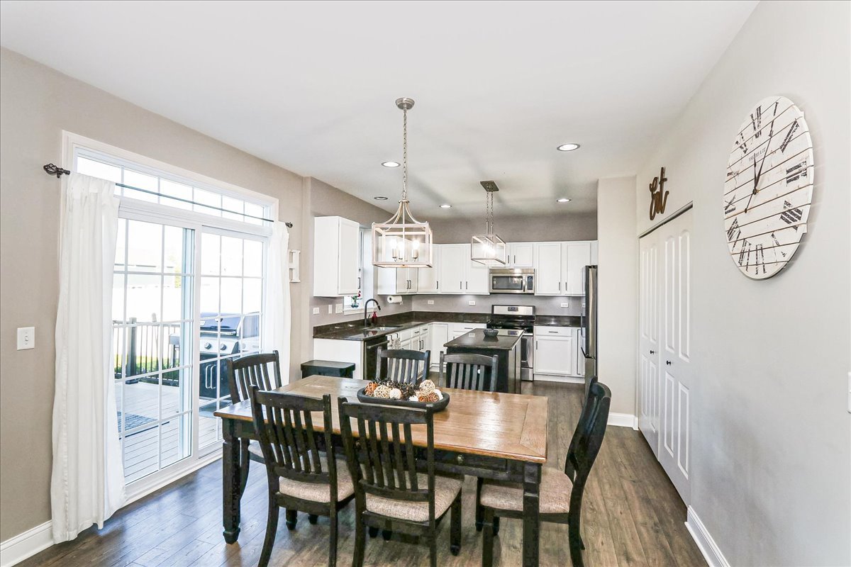 342 Snowdrop Lane Elgin, IL 60124 - Photo 11 of 28 a dining room with furniture and window