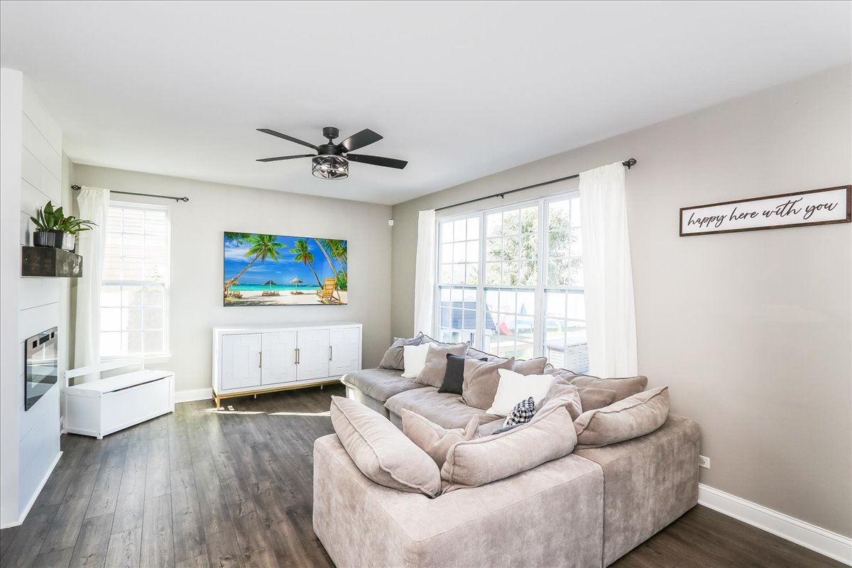 342 Snowdrop Lane Elgin, IL 60124 - Photo 12 of 28 a living room with furniture and a flat screen tv