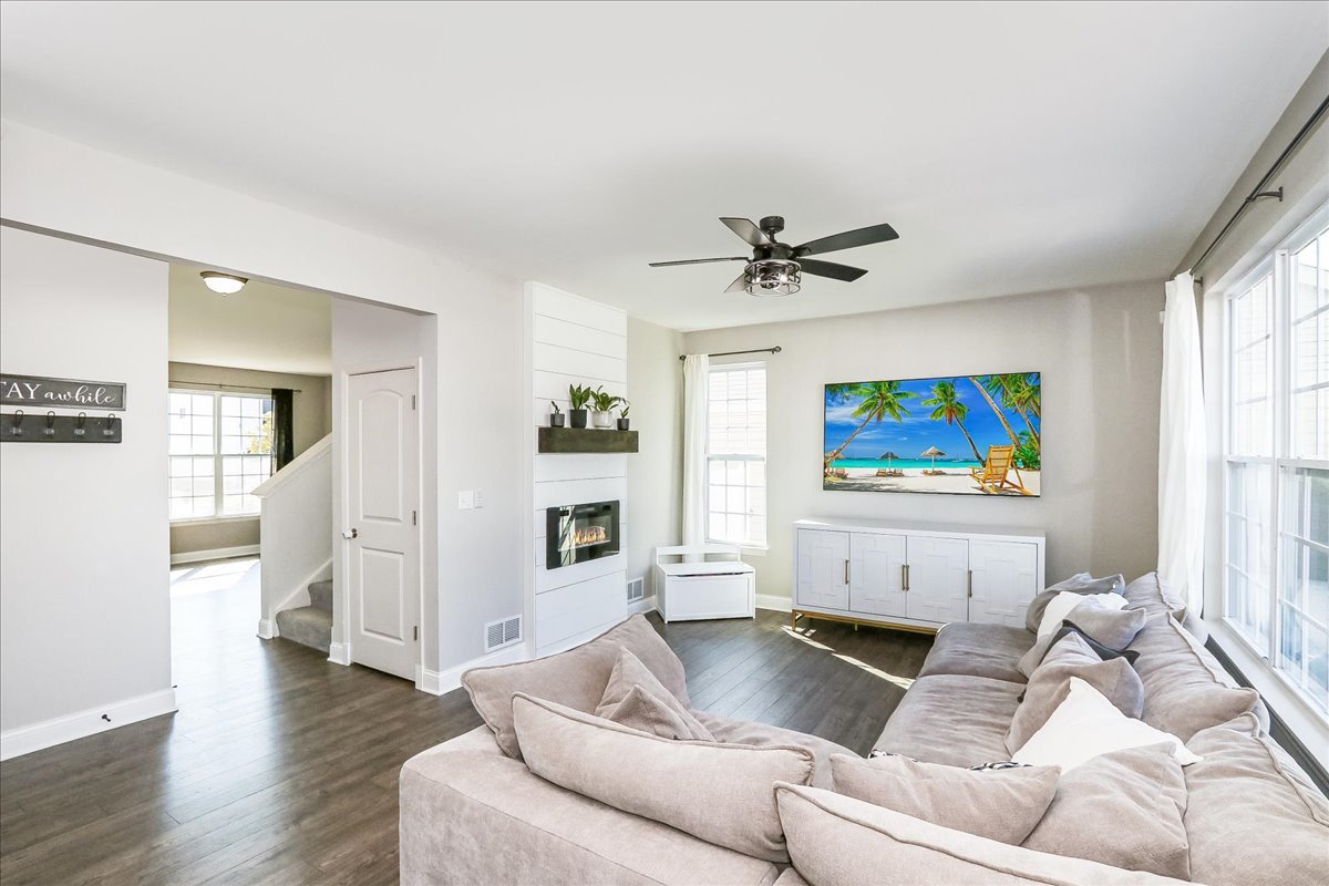 342 Snowdrop Lane Elgin, IL 60124 - Photo 13 of 28 a living room with furniture and a flat screen tv