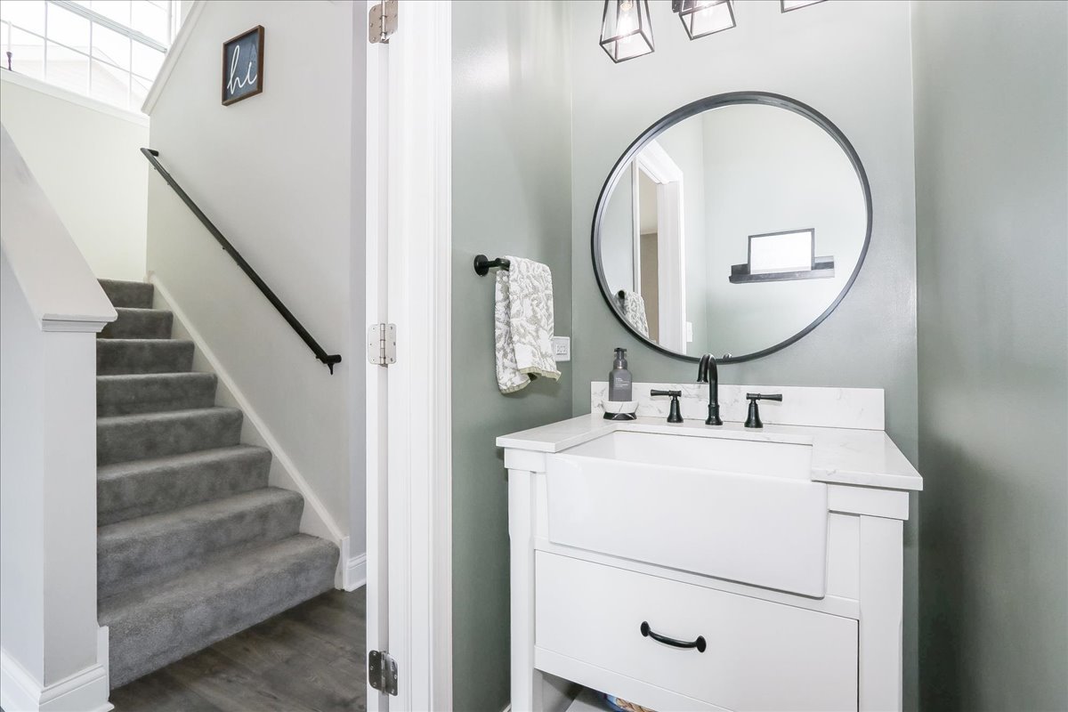 342 Snowdrop Lane Elgin, IL 60124 - Photo 15 of 28 a bathroom with a sink and a mirror