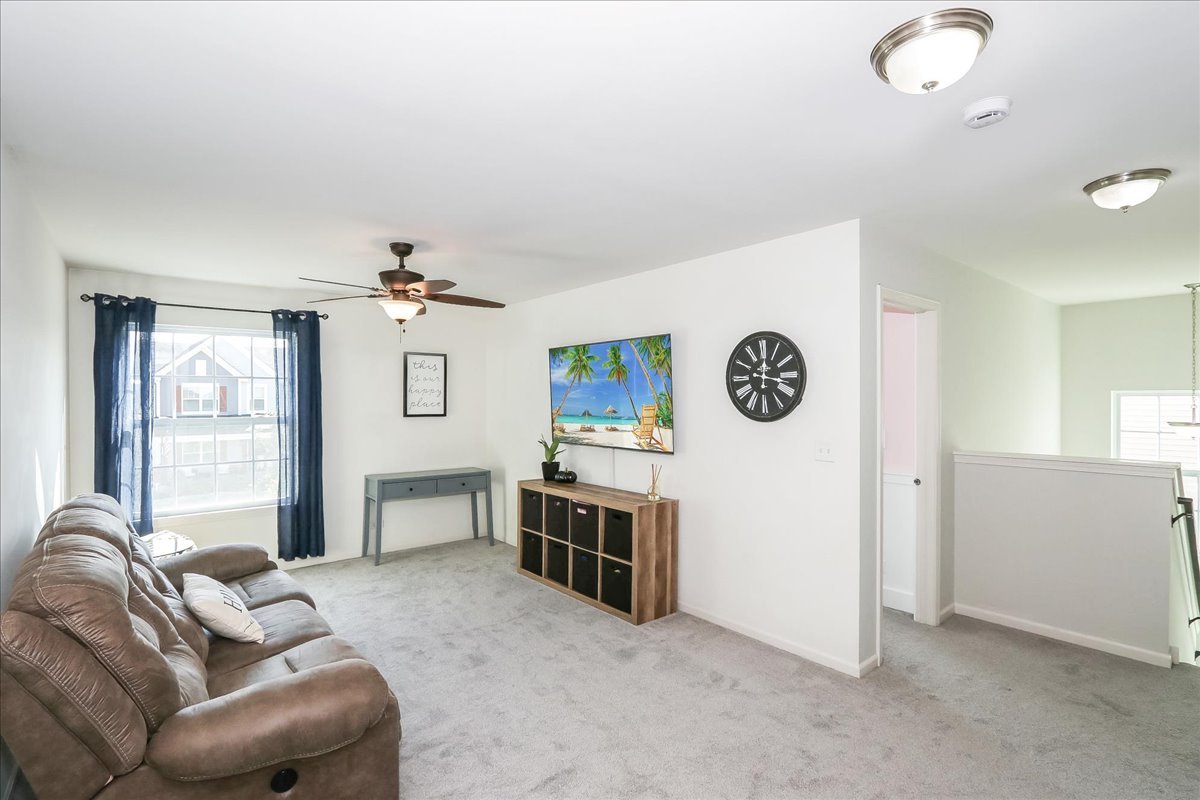 342 Snowdrop Lane Elgin, IL 60124 - Photo 16 of 28 a living room with furniture and a window