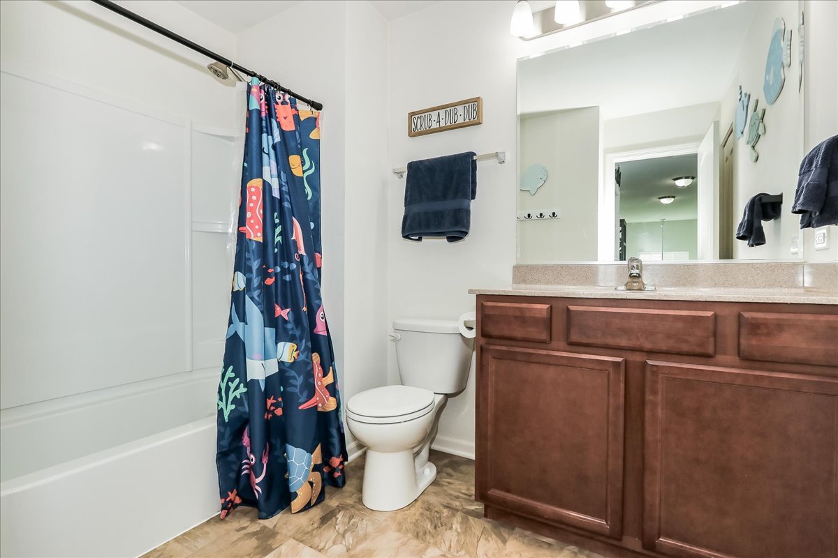342 Snowdrop Lane Elgin, IL 60124 - Photo 24 of 28 a bathroom with a sink toilet and shower