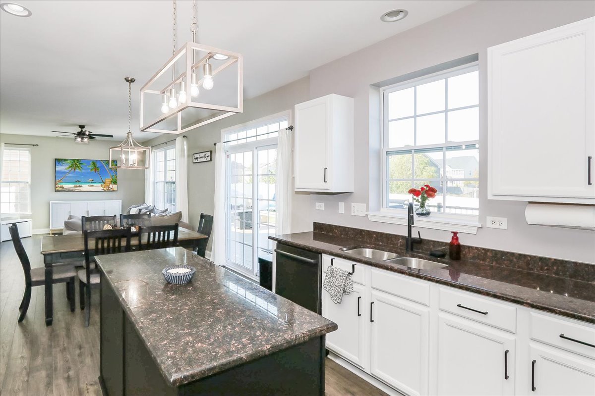 342 Snowdrop Lane Elgin, IL 60124 - Photo 9 of 28 a kitchen with granite countertop lots of counter top space and dining table
