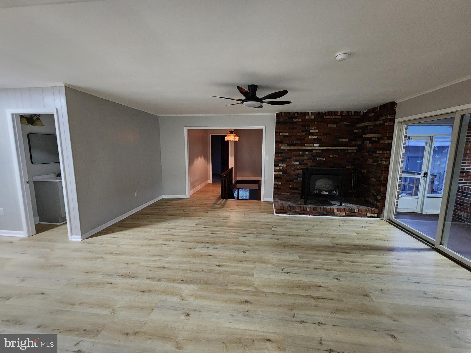 20307 Pond Circle Road Midlothian, MD 21543 - Photo 16 of 29 a view of an empty room with a fireplace