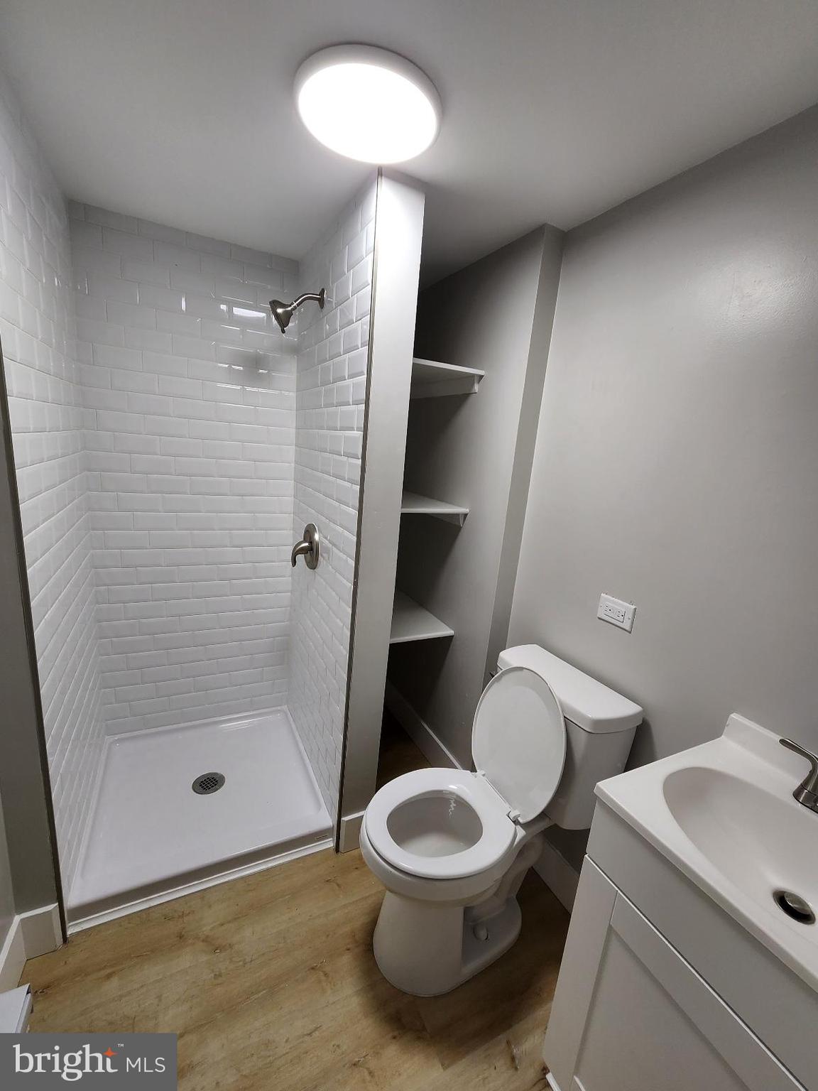 20307 Pond Circle Road Midlothian, MD 21543 - Photo 17 of 29 a bathroom with a toilet and a shower