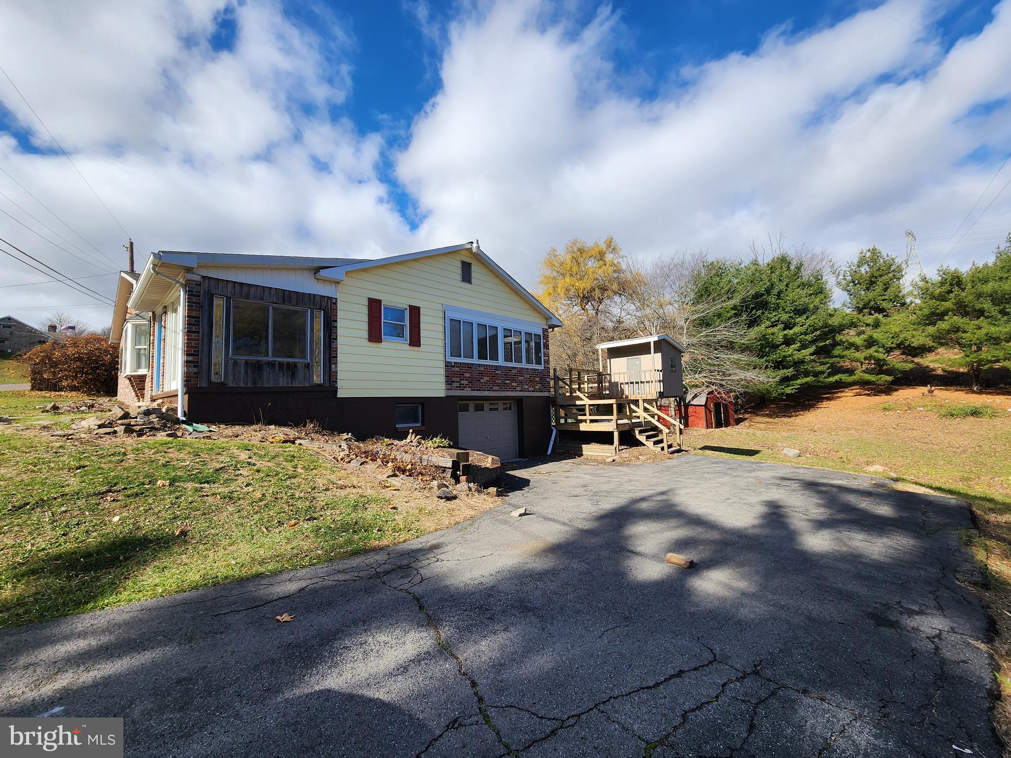 20307 Pond Circle Road Midlothian, MD 21543 - Photo 2 of 29 a view of a house with wooden fence