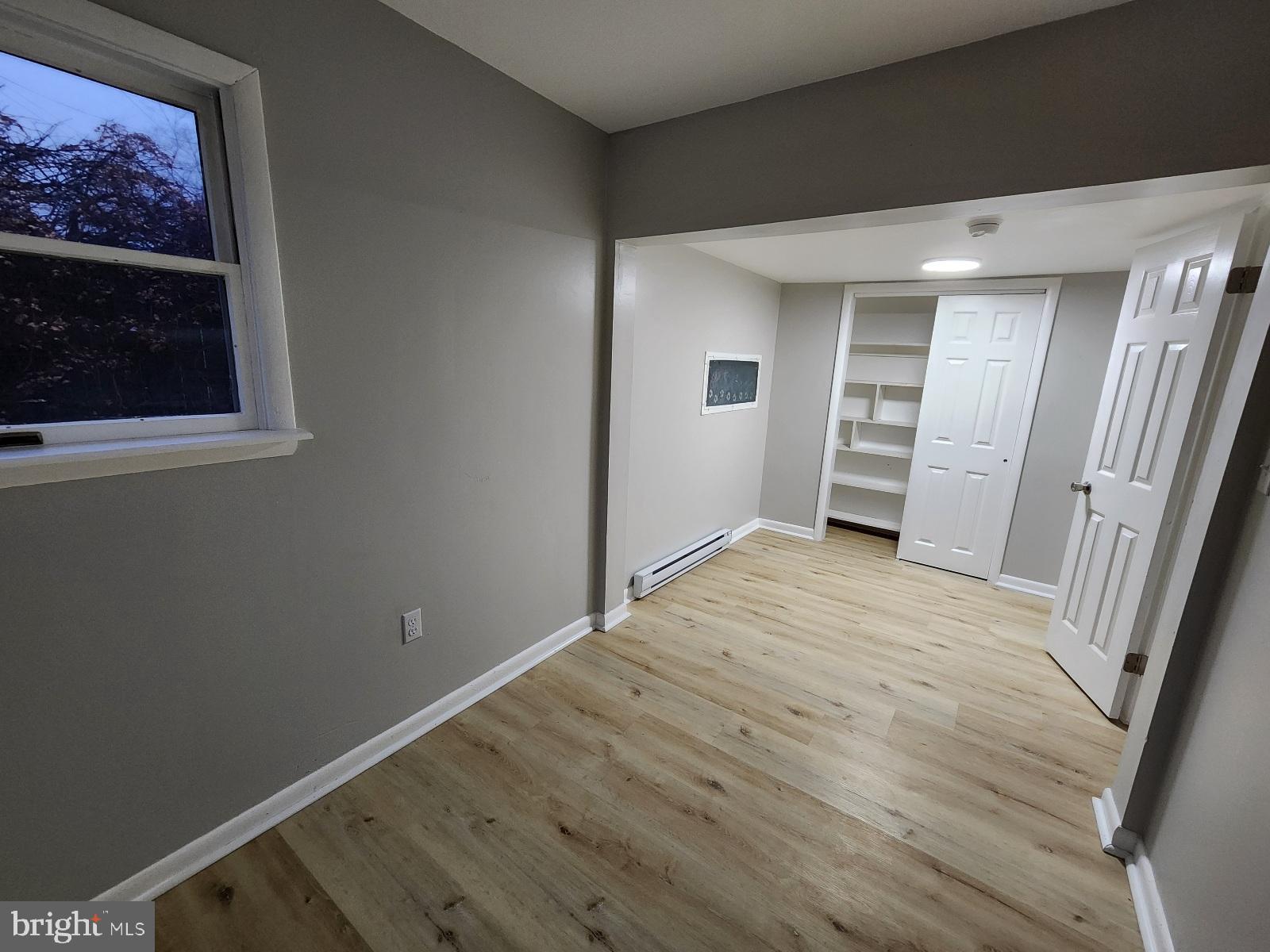 20307 Pond Circle Road Midlothian, MD 21543 - Photo 20 of 29 a view of empty room with wooden floor