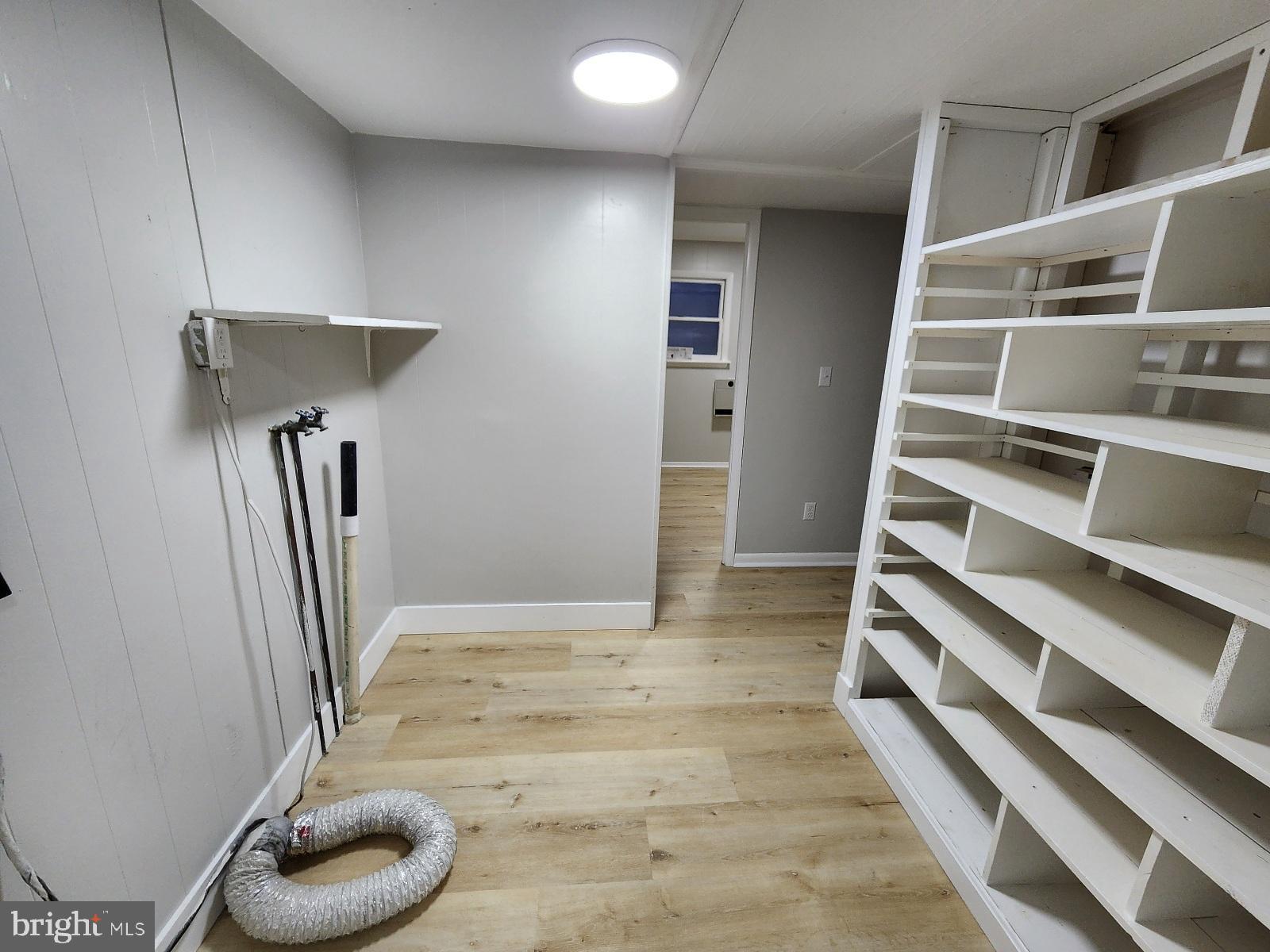 20307 Pond Circle Road Midlothian, MD 21543 - Photo 24 of 29 a view of a livingroom with furniture and closet