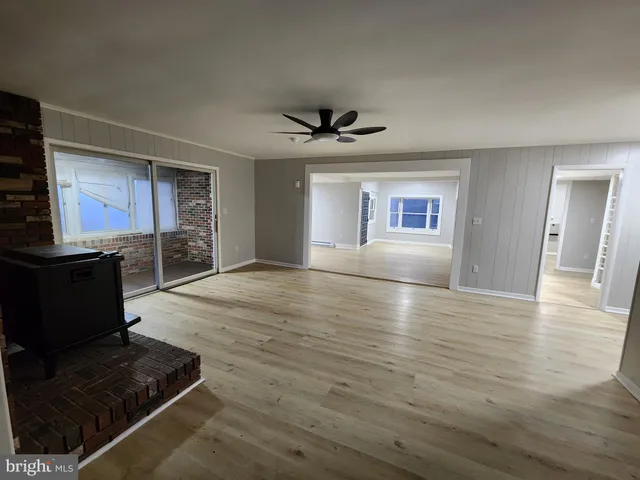 a bathroom with a sink toilet and mirror