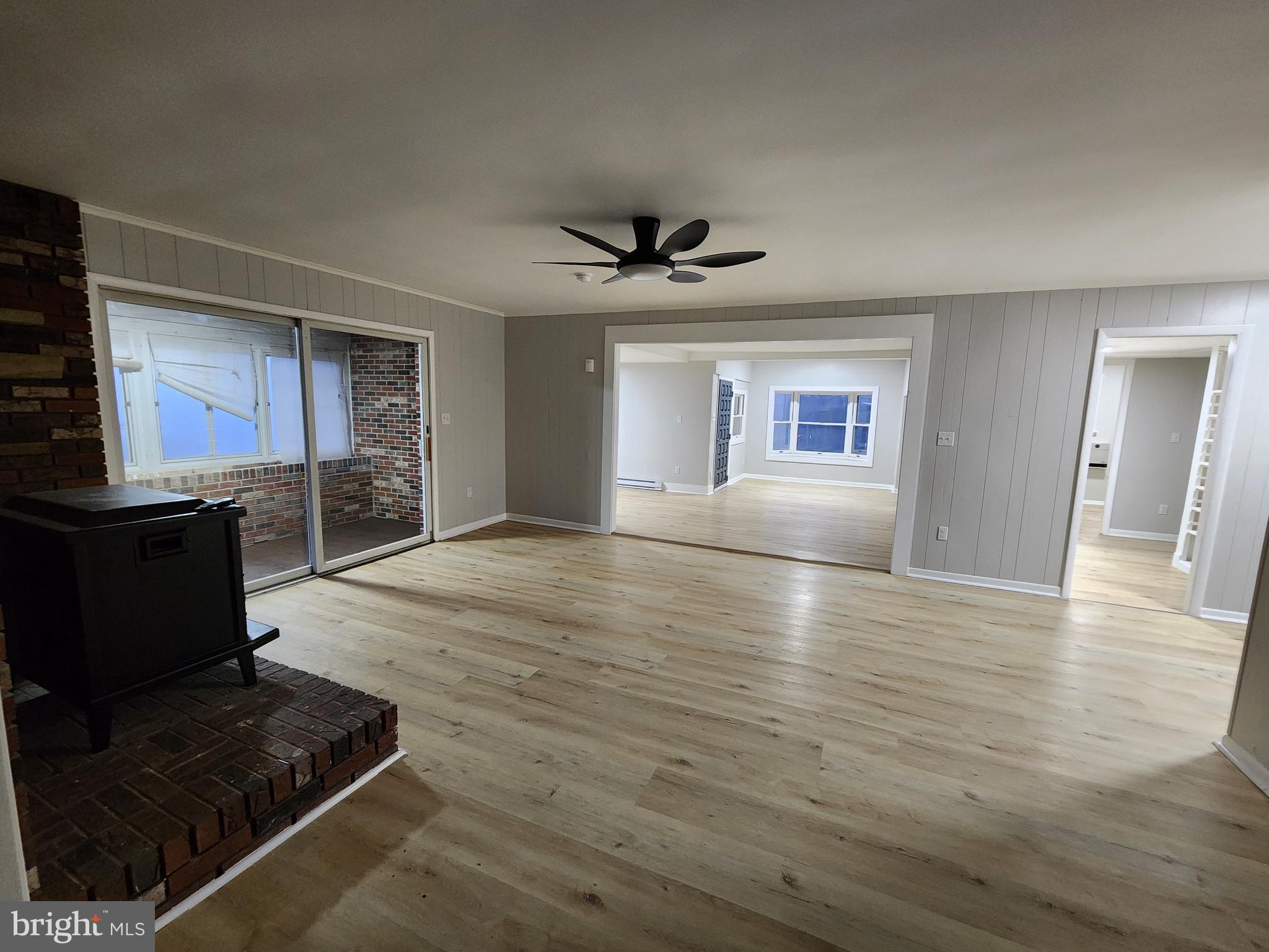 20307 Pond Circle Road Midlothian, MD 21543 - Photo 26 of 29 a view of a livingroom with a furniture wooden floor and window