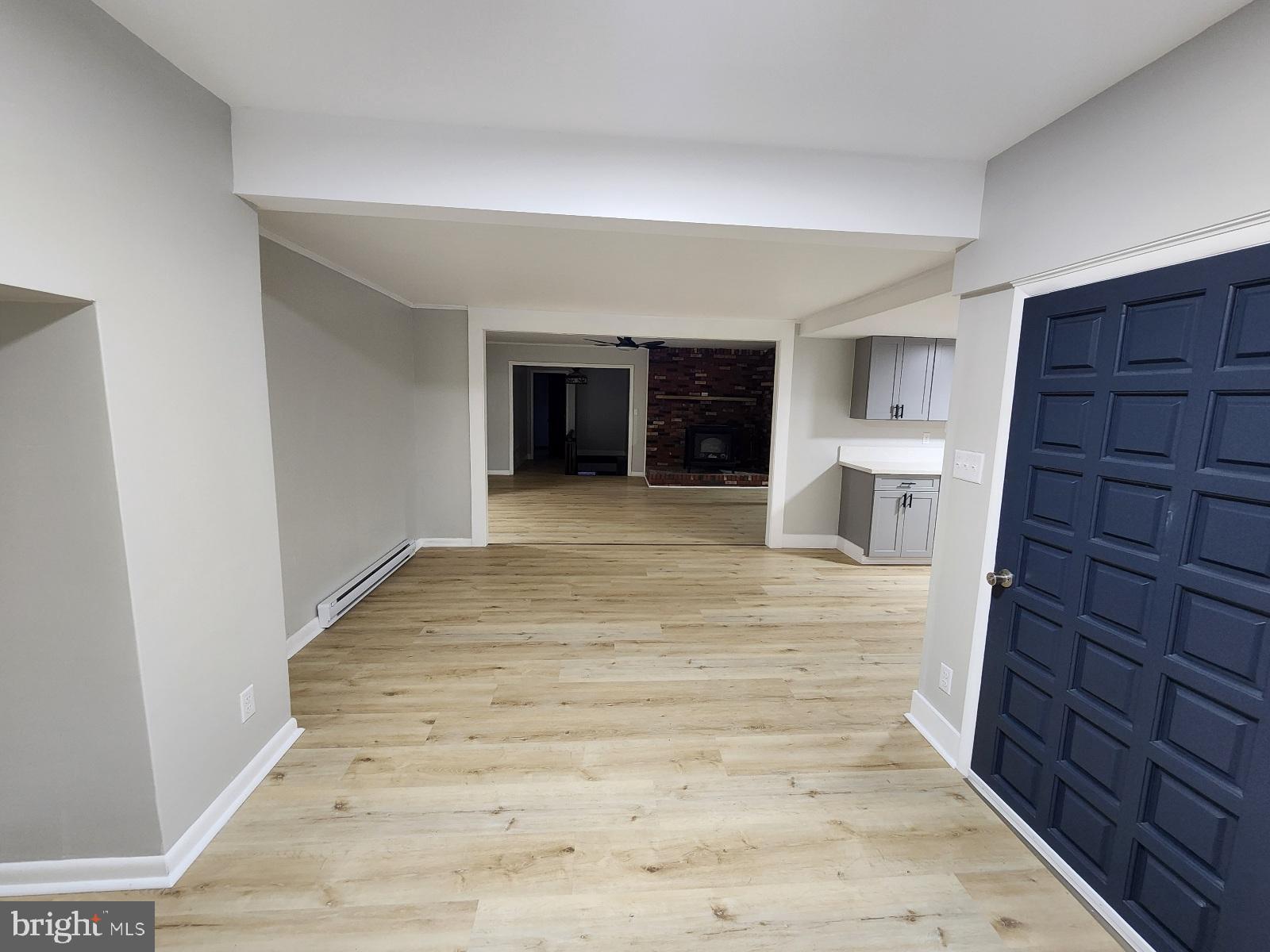 20307 Pond Circle Road Midlothian, MD 21543 - Photo 28 of 29 a view of an empty room with wooden floor and a window