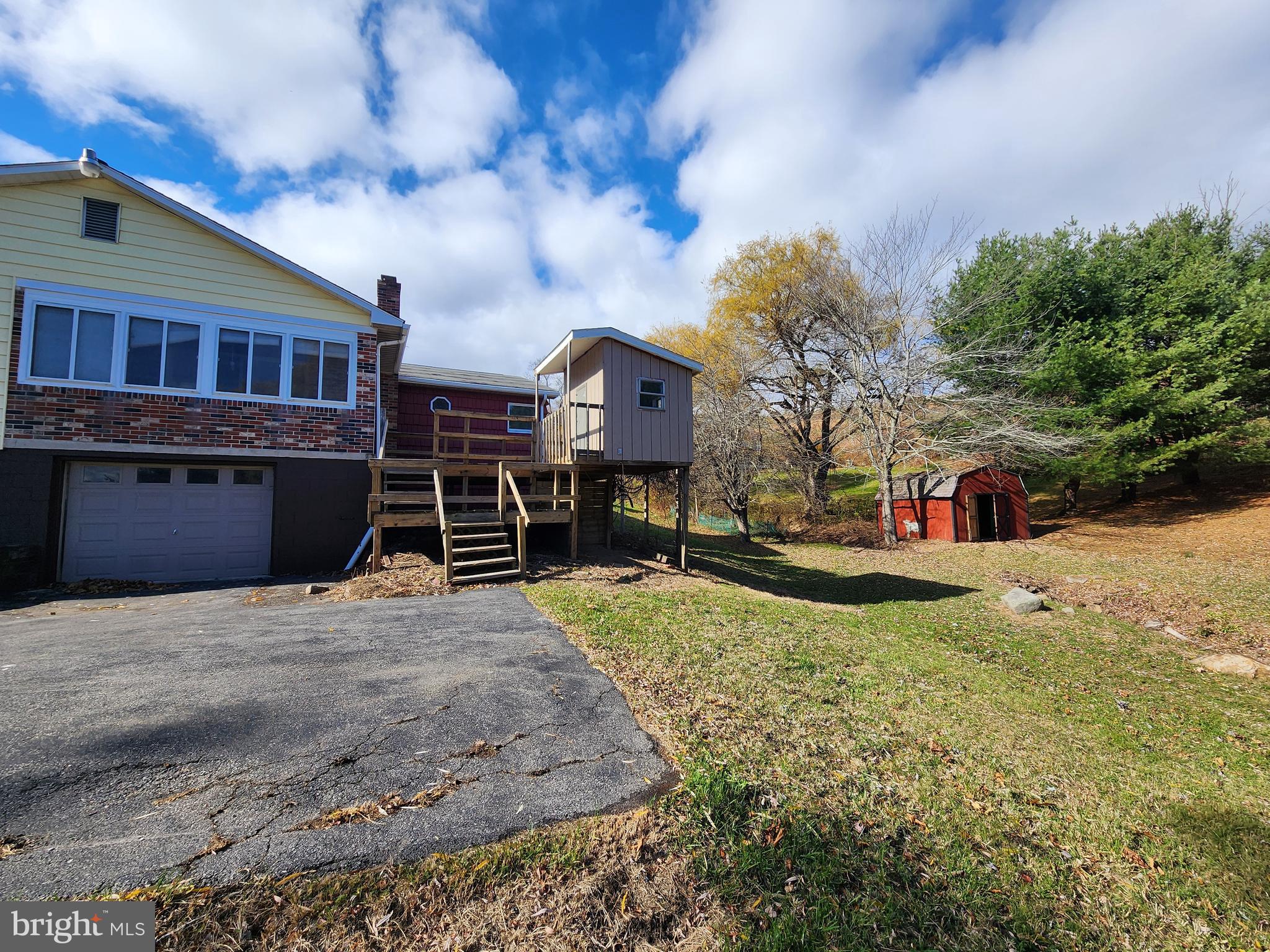 20307 Pond Circle Road Midlothian, MD 21543 - Photo 4 of 29 a front view of a house with a yard