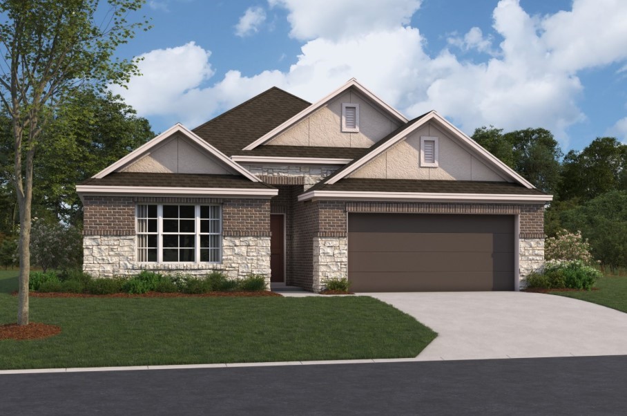 a front view of a house with a garden and yard