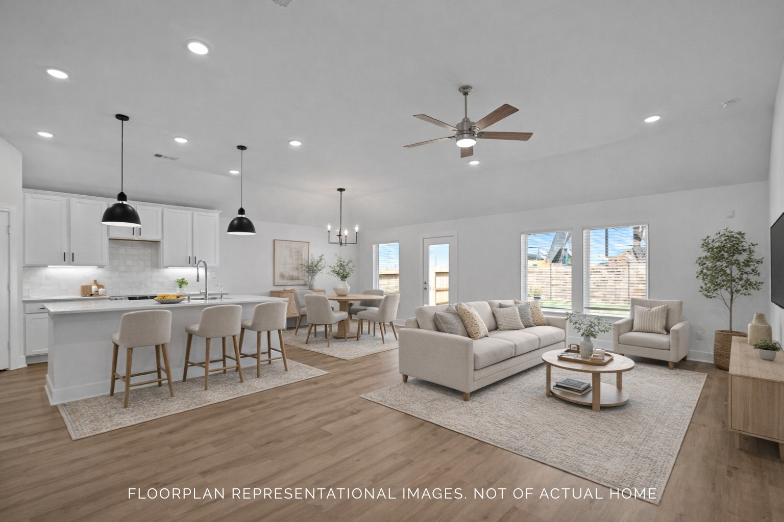 2123 Lone Bronco Boulevard Rosenberg, TX 77471 - Photo 11 of 16 a living room with lots of furniture and a chandelier