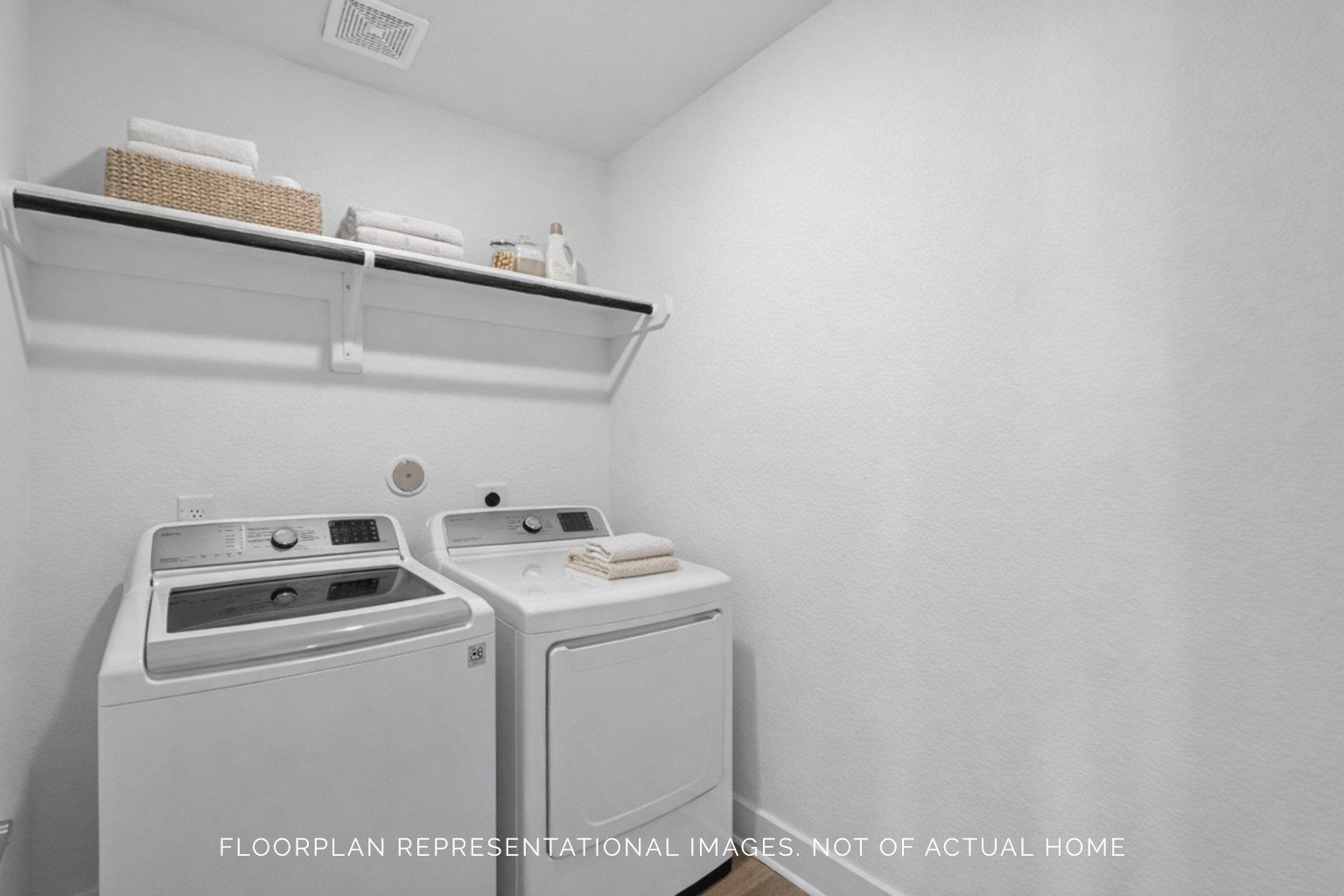 2123 Lone Bronco Boulevard Rosenberg, TX 77471 - Photo 12 of 16 a utility room with dryer and washer