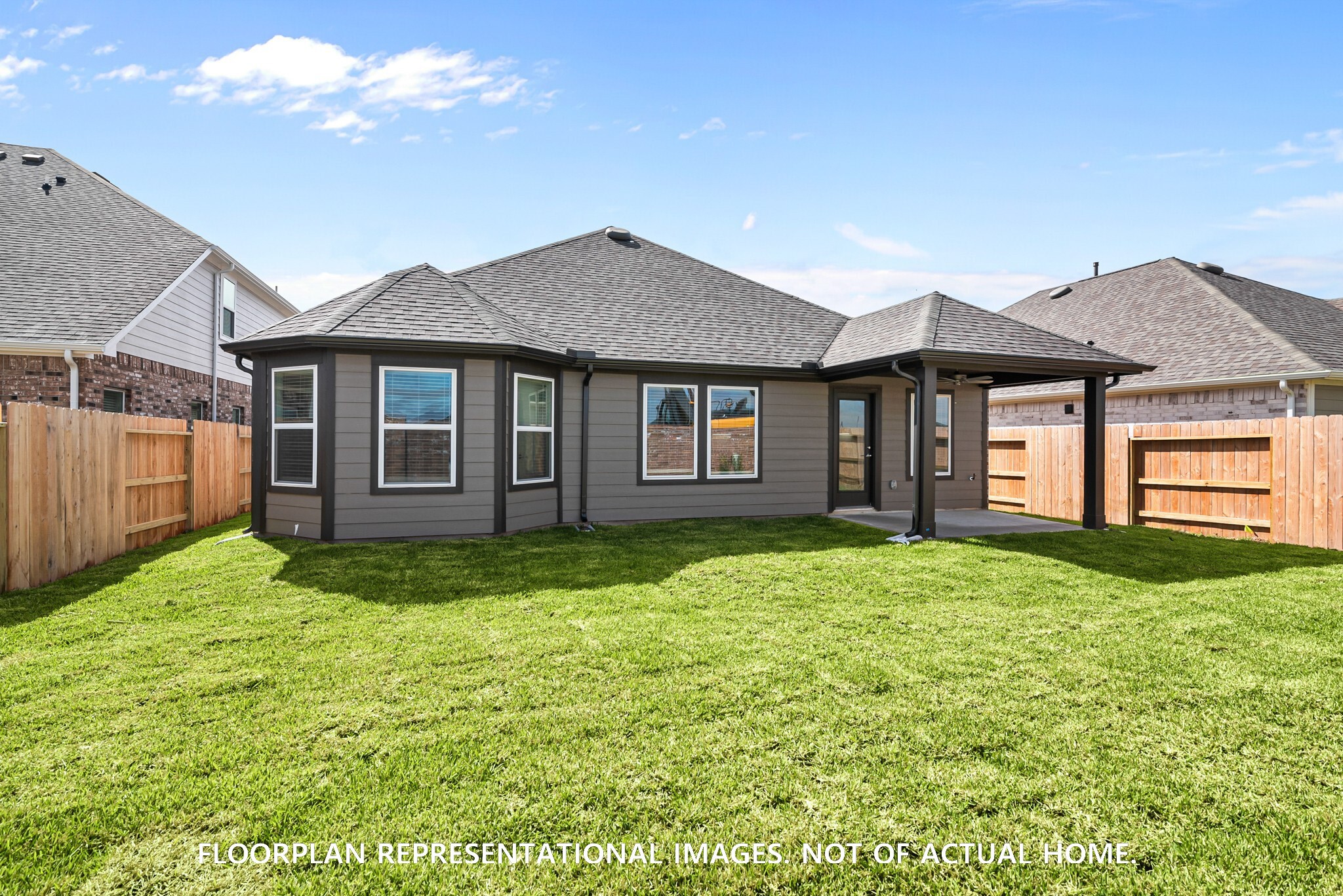 2123 Lone Bronco Boulevard Rosenberg, TX 77471 - Photo 5 of 16 a house view with a garden space