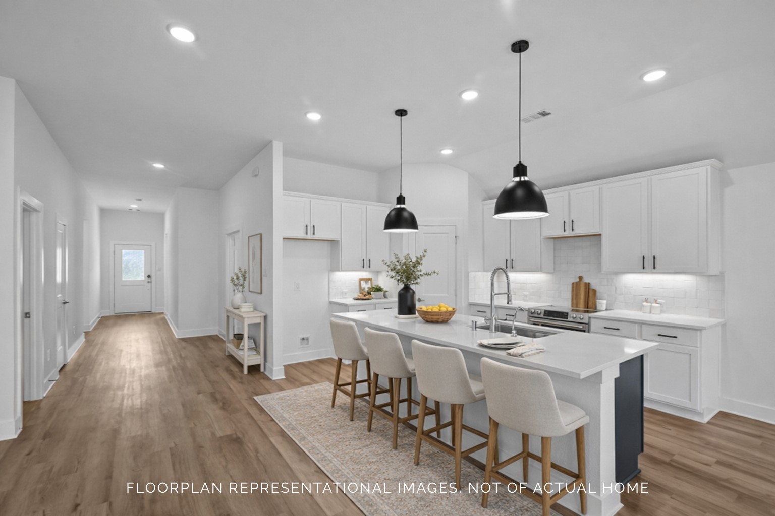 2123 Lone Bronco Boulevard Rosenberg, TX 77471 - Photo 6 of 16 a kitchen with stainless steel appliances a dining table chairs stove and sink