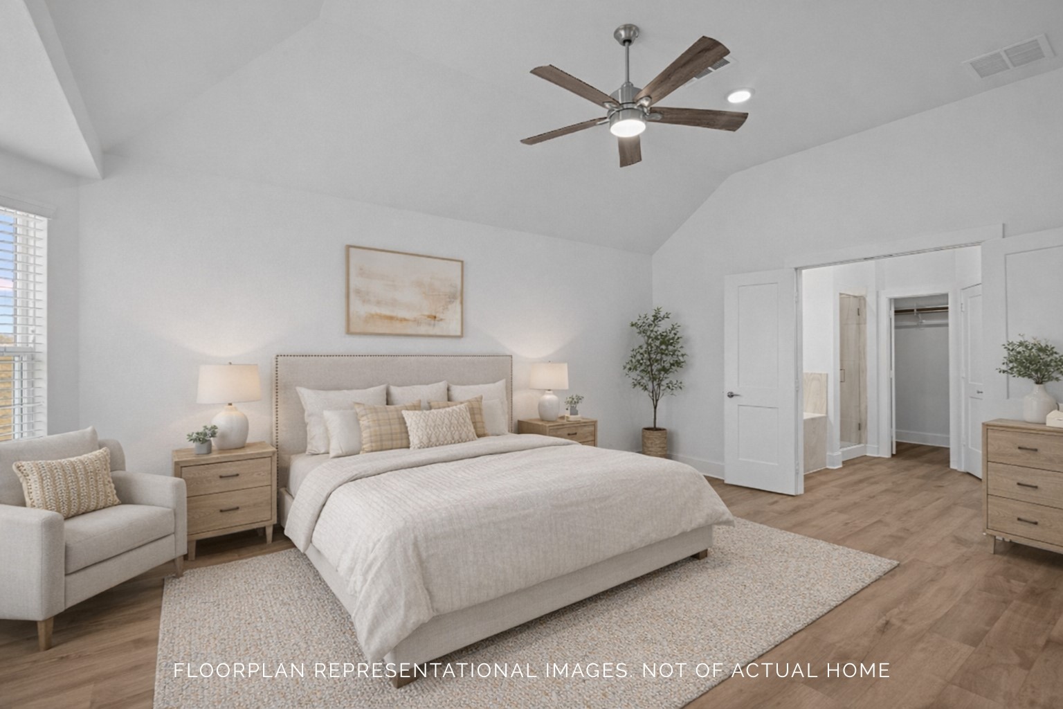 2123 Lone Bronco Boulevard Rosenberg, TX 77471 - Photo 10 of 16 a bedroom with a large bed couch and a window