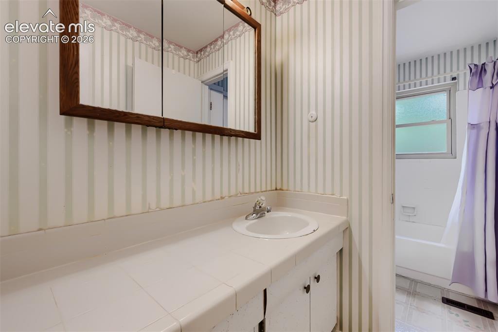 4618 Ridgeglen Road Colorado Springs, CO 80918 - Photo 15 of 27 Main floor bathroom