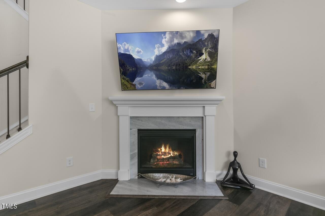 3356 Table Mountain Pine Drive Raleigh, NC 27616 - Photo 13 of 41 a living room with a fireplace