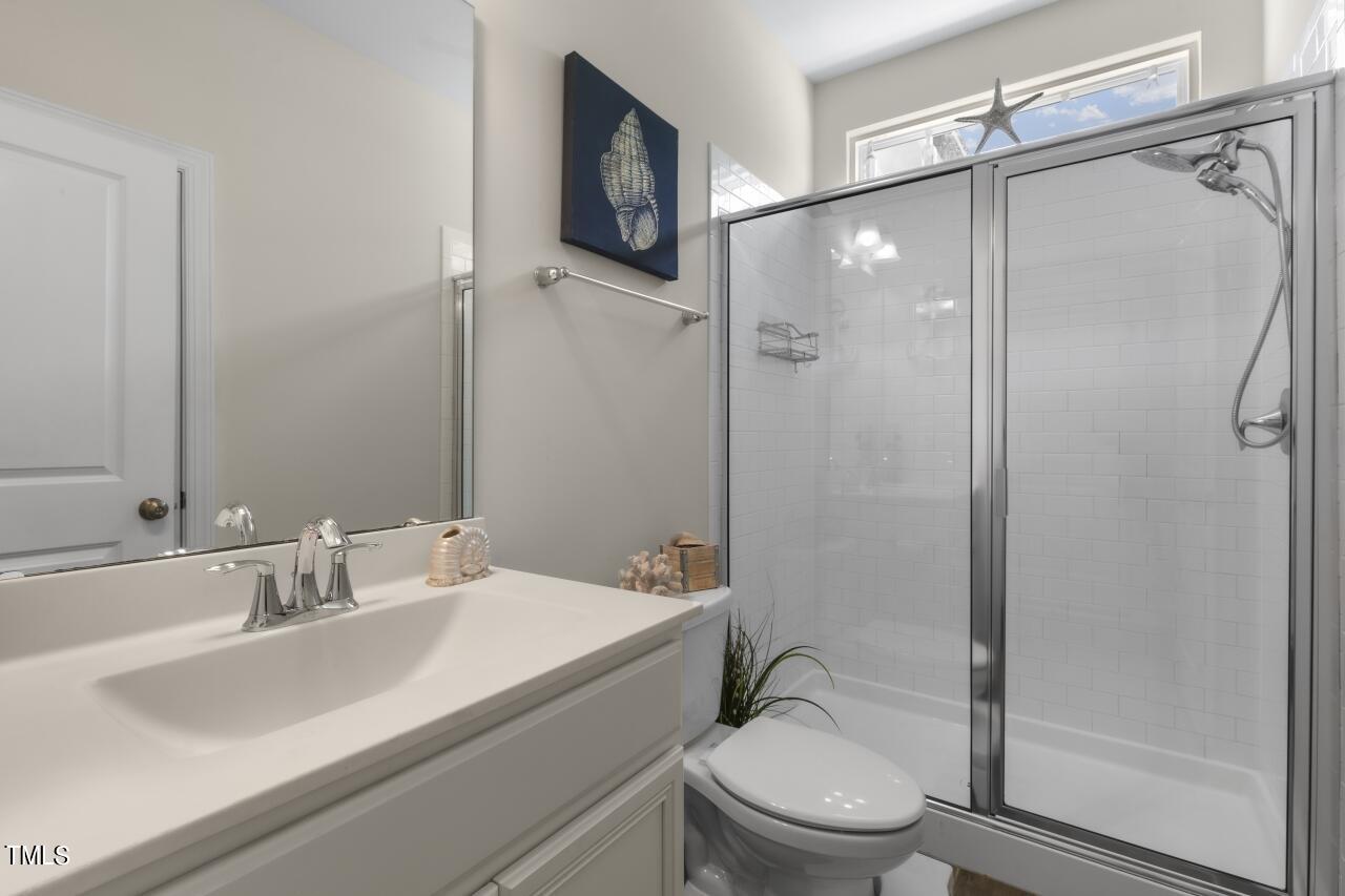 3356 Table Mountain Pine Drive Raleigh, NC 27616 - Photo 18 of 41 a bathroom with a sink toilet and shower