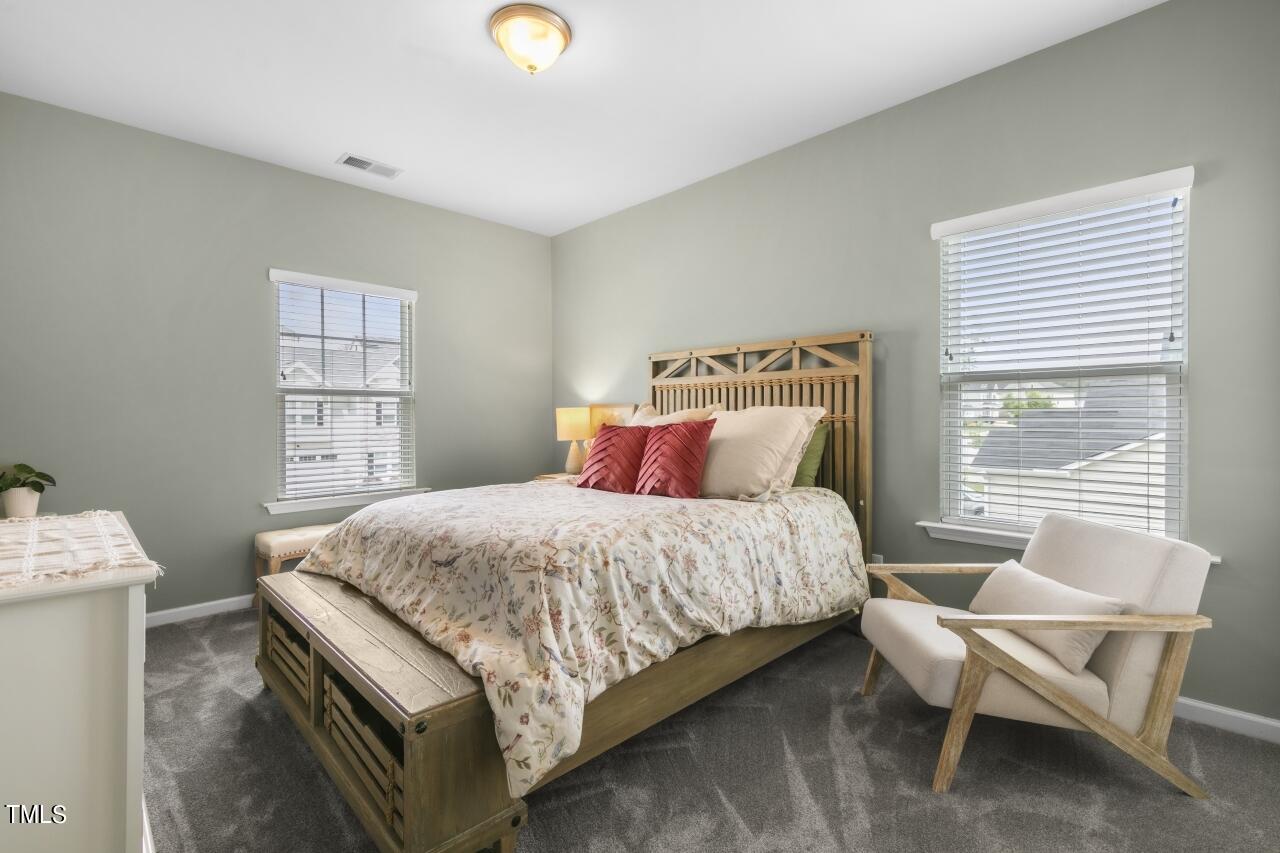 3356 Table Mountain Pine Drive Raleigh, NC 27616 - Photo 26 of 41 a bedroom with a bed and window