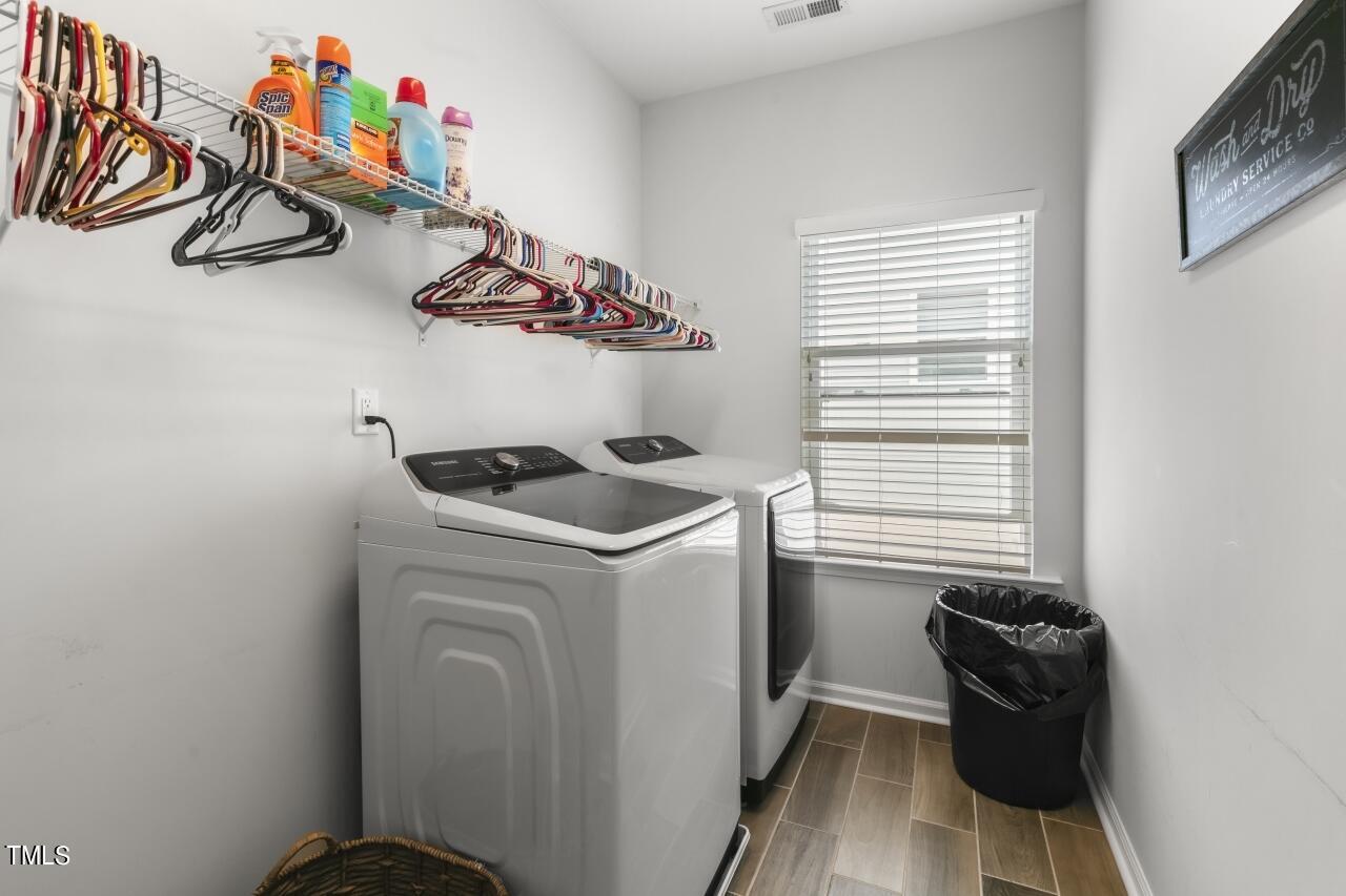 3356 Table Mountain Pine Drive Raleigh, NC 27616 - Photo 32 of 41 a utility room with dryer and washer
