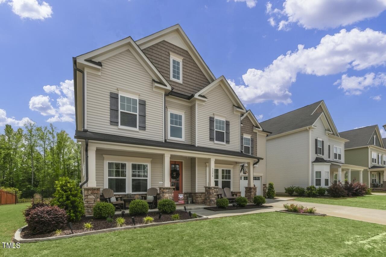 3356 Table Mountain Pine Drive Raleigh, NC 27616 - Photo 34 of 41 a front view of a house with a yard