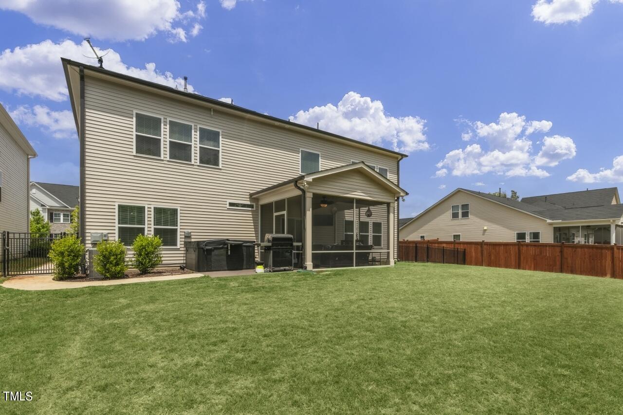 3356 Table Mountain Pine Drive Raleigh, NC 27616 - Photo 36 of 41 a front view of a house with a yard
