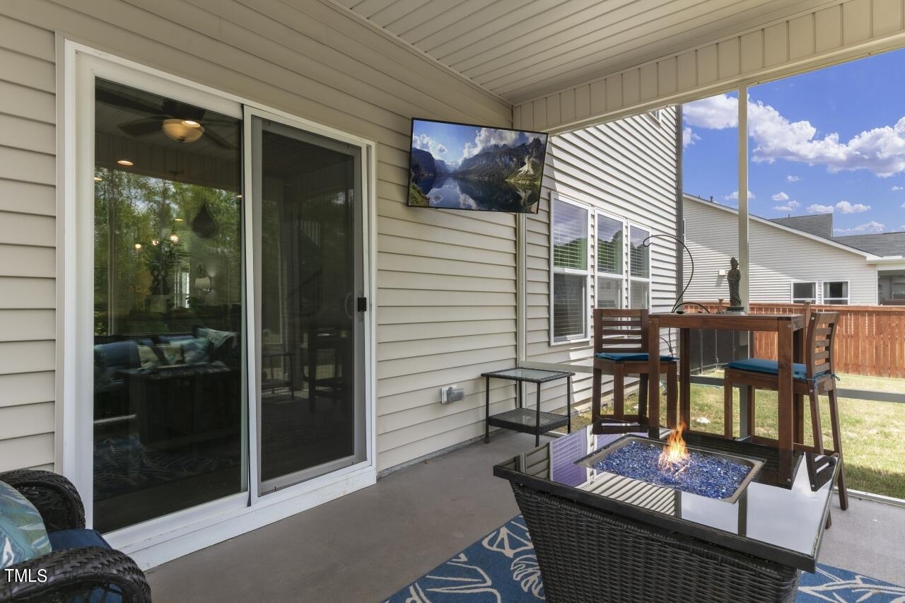3356 Table Mountain Pine Drive Raleigh, NC 27616 - Photo 37 of 41 a balcony with furniture and outdoor view