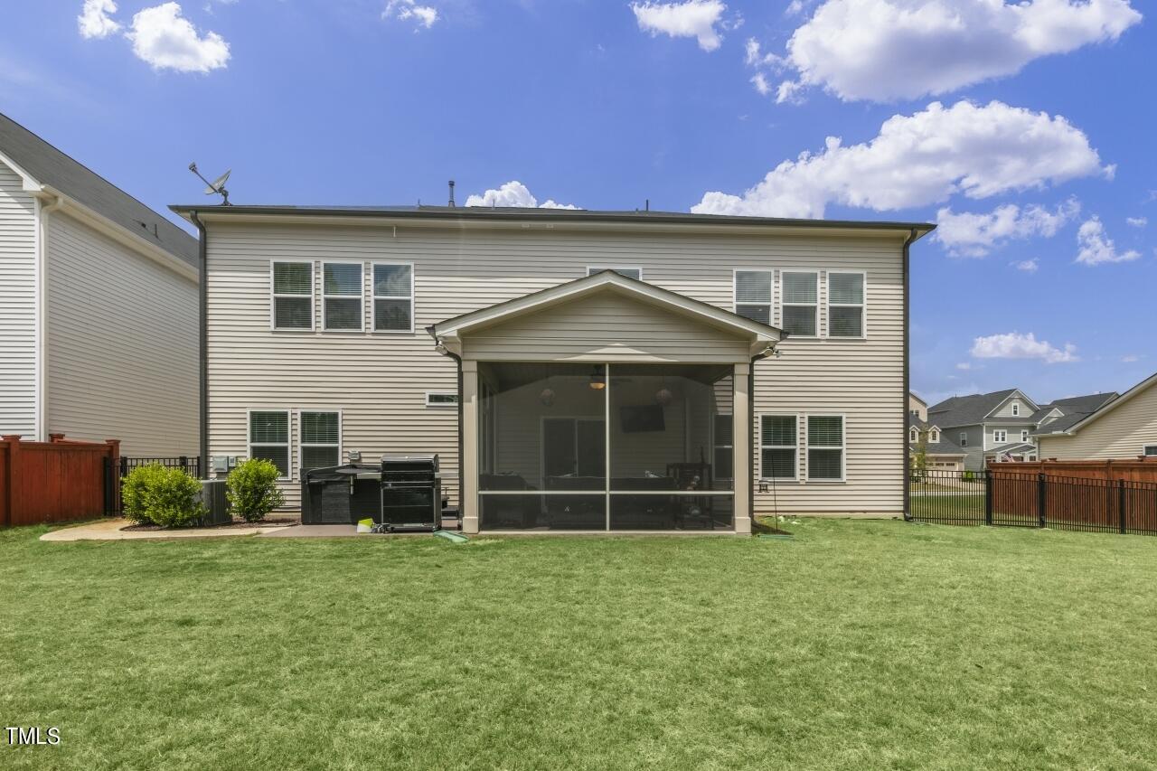 3356 Table Mountain Pine Drive Raleigh, NC 27616 - Photo 39 of 41 a front view of a house with a garden