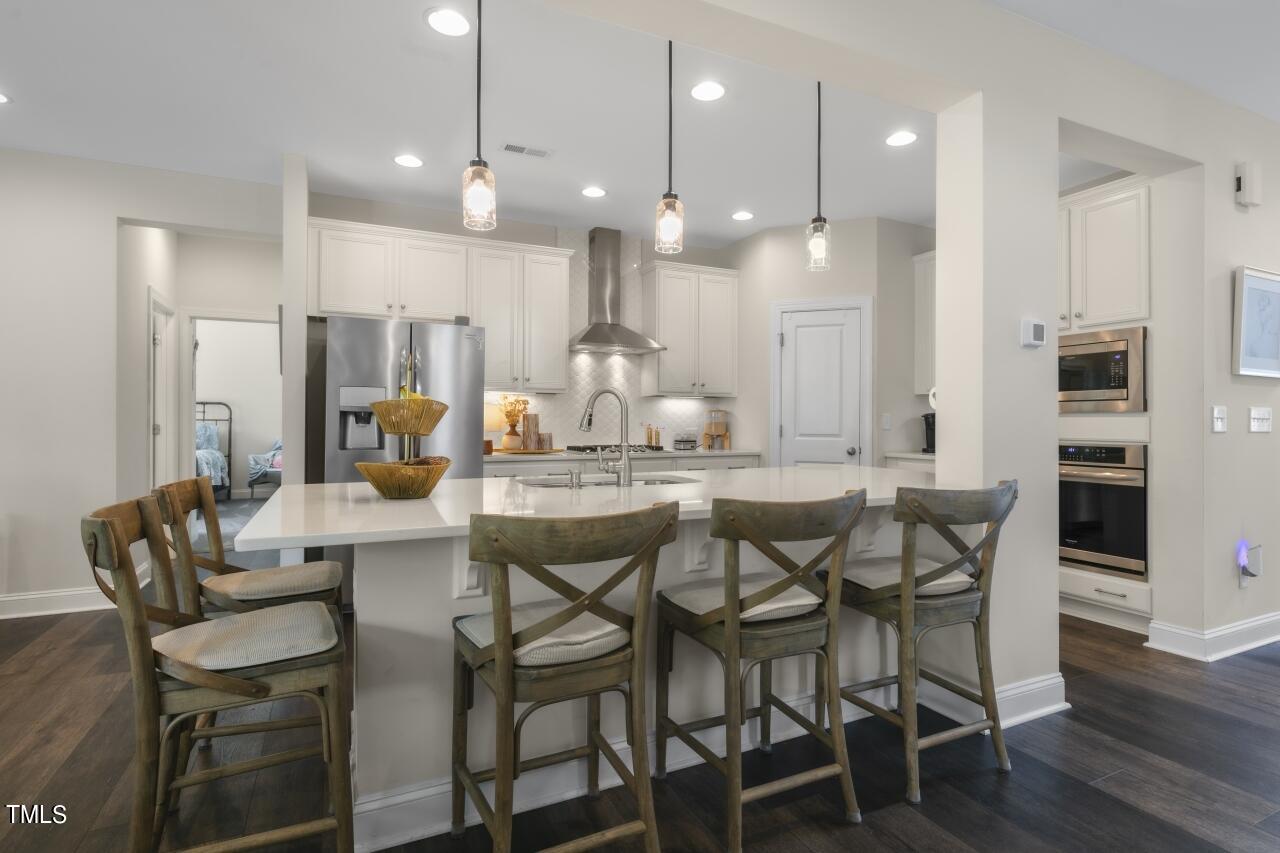 3356 Table Mountain Pine Drive Raleigh, NC 27616 - Photo 7 of 41 a view of a dining room with furniture
