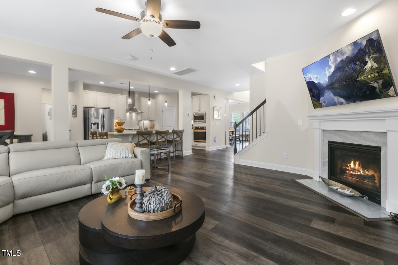 3356 Table Mountain Pine Drive Raleigh, NC 27616 - Photo 10 of 41 a living room with furniture and a fireplace