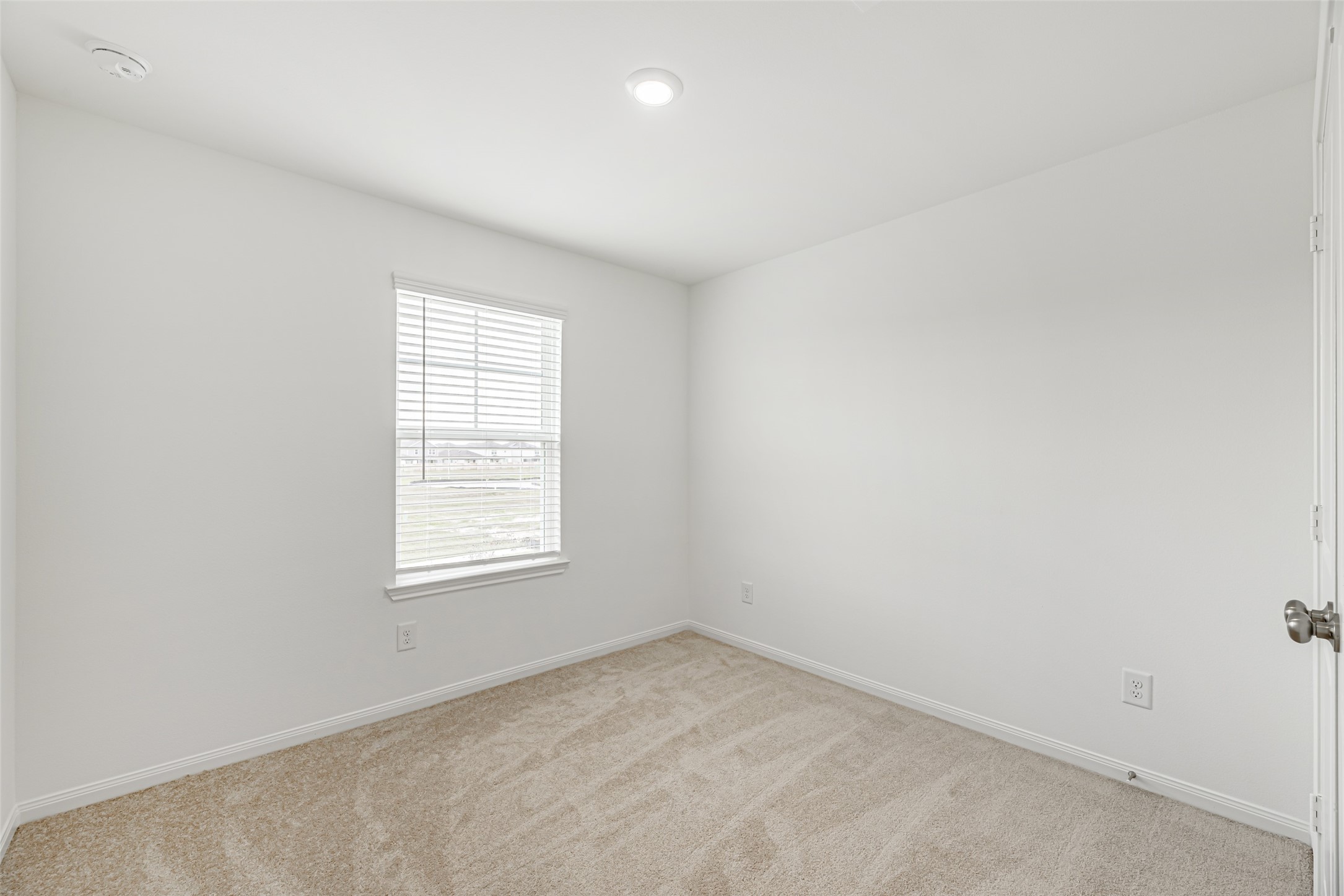 23422 Wagon Cart Road Hockley, TX 77447 - Photo 23 of 28 an empty room with a window