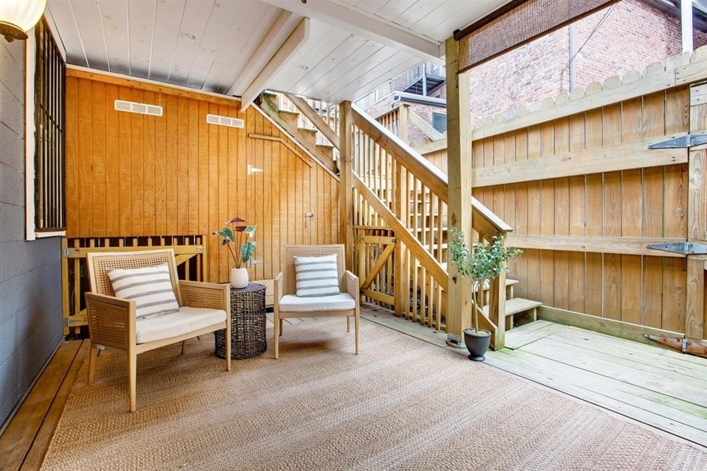 5 Bond Street, Unit 1 Boston, MA 02118 - Photo 14 of 18 a view of entryway with a house and wooden floor