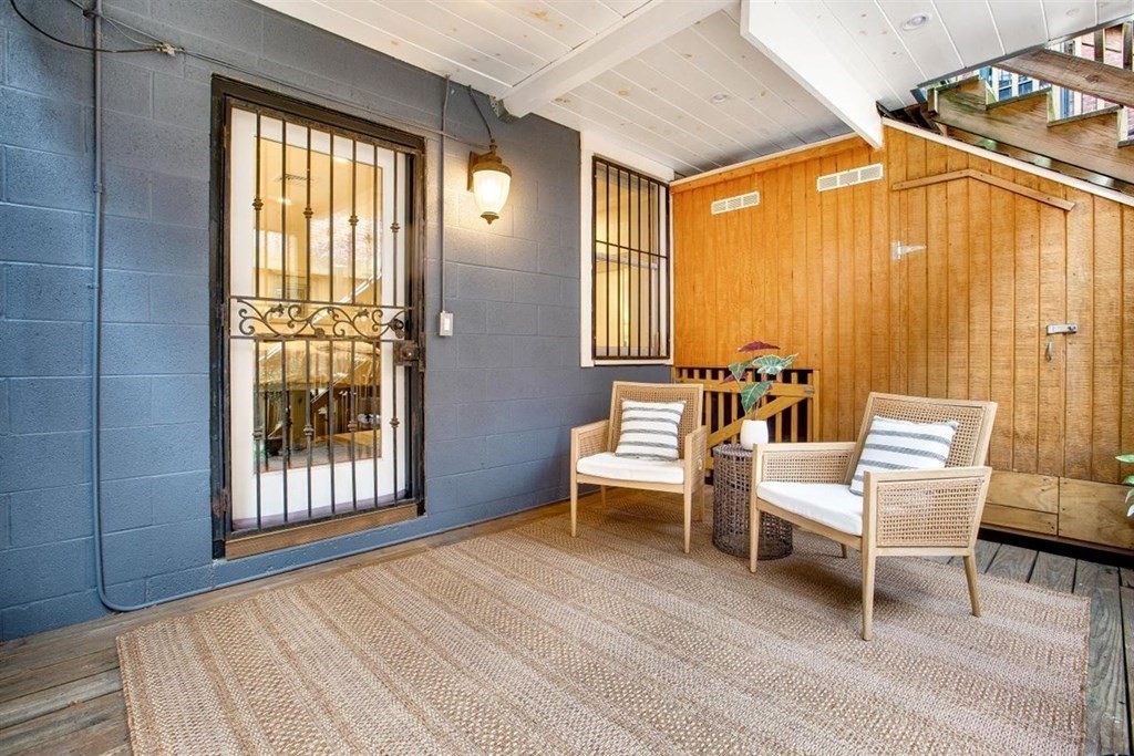 5 Bond Street, Unit 1 Boston, MA 02118 - Photo 15 of 18 a view of a livingroom with furniture and wooden floor