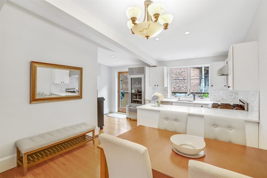 5 Bond Street, Unit 1 Boston, MA 02118 - Photo 6 of 18 a kitchen with a sink appliances and cabinets