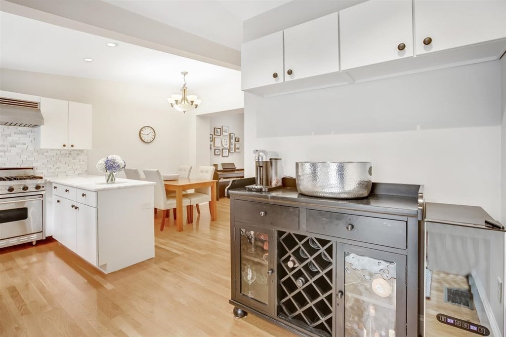 5 Bond Street, Unit 1 Boston, MA 02118 - Photo 8 of 18 a kitchen with a stove and cabinets