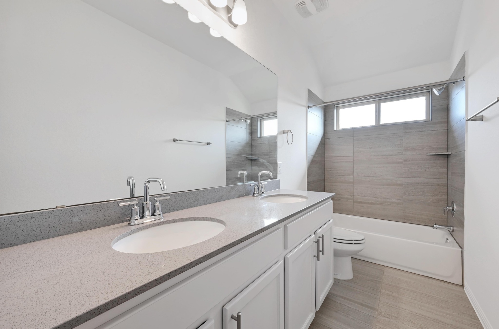 13221 Mariscan Street Manchaca, TX 78652 - Photo 28 of 36 a bathroom with a granite countertop sink toilet and shower