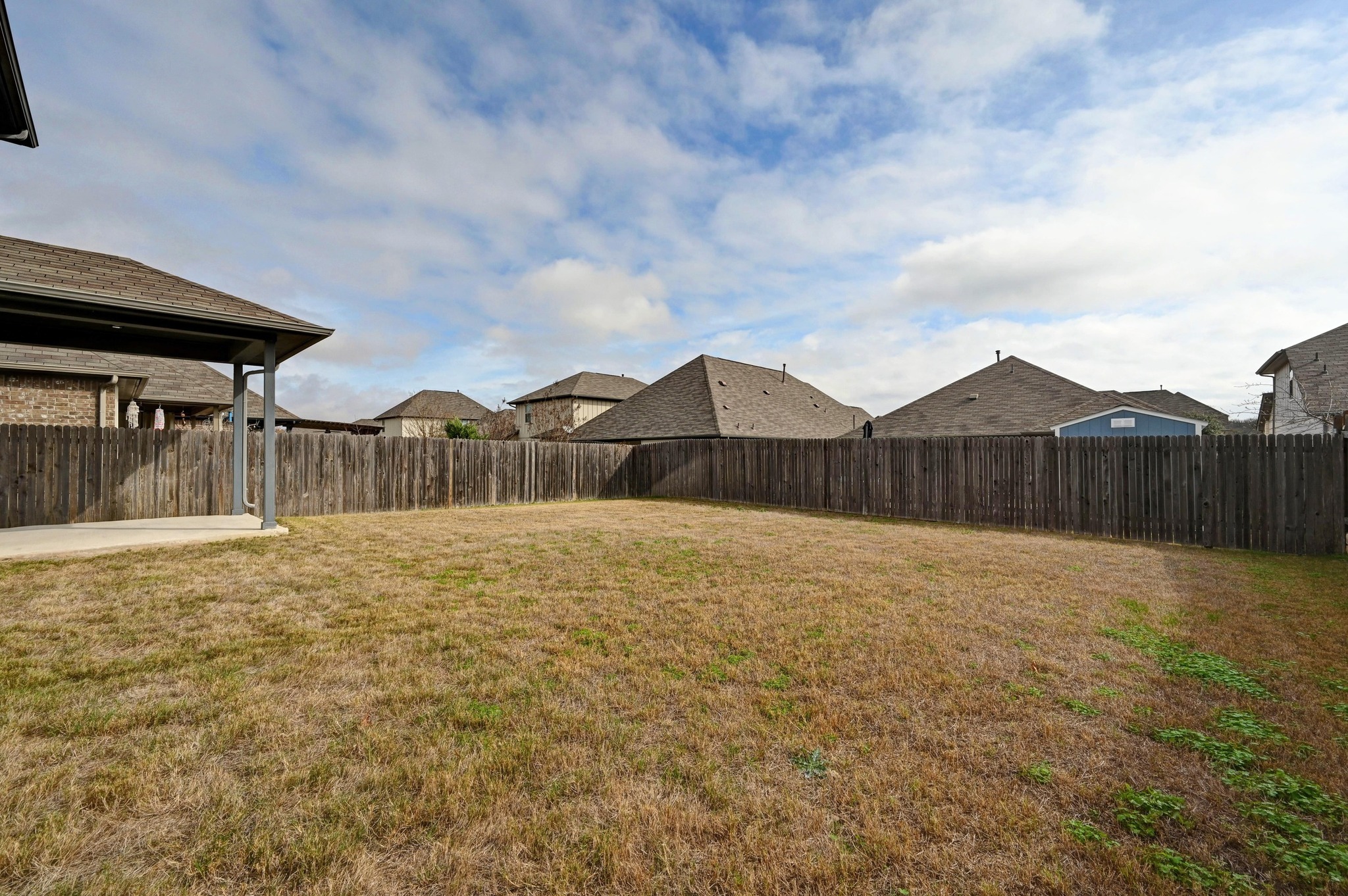 13221 Mariscan Street Manchaca, TX 78652 - Photo 30 of 36 a view of a backyard
