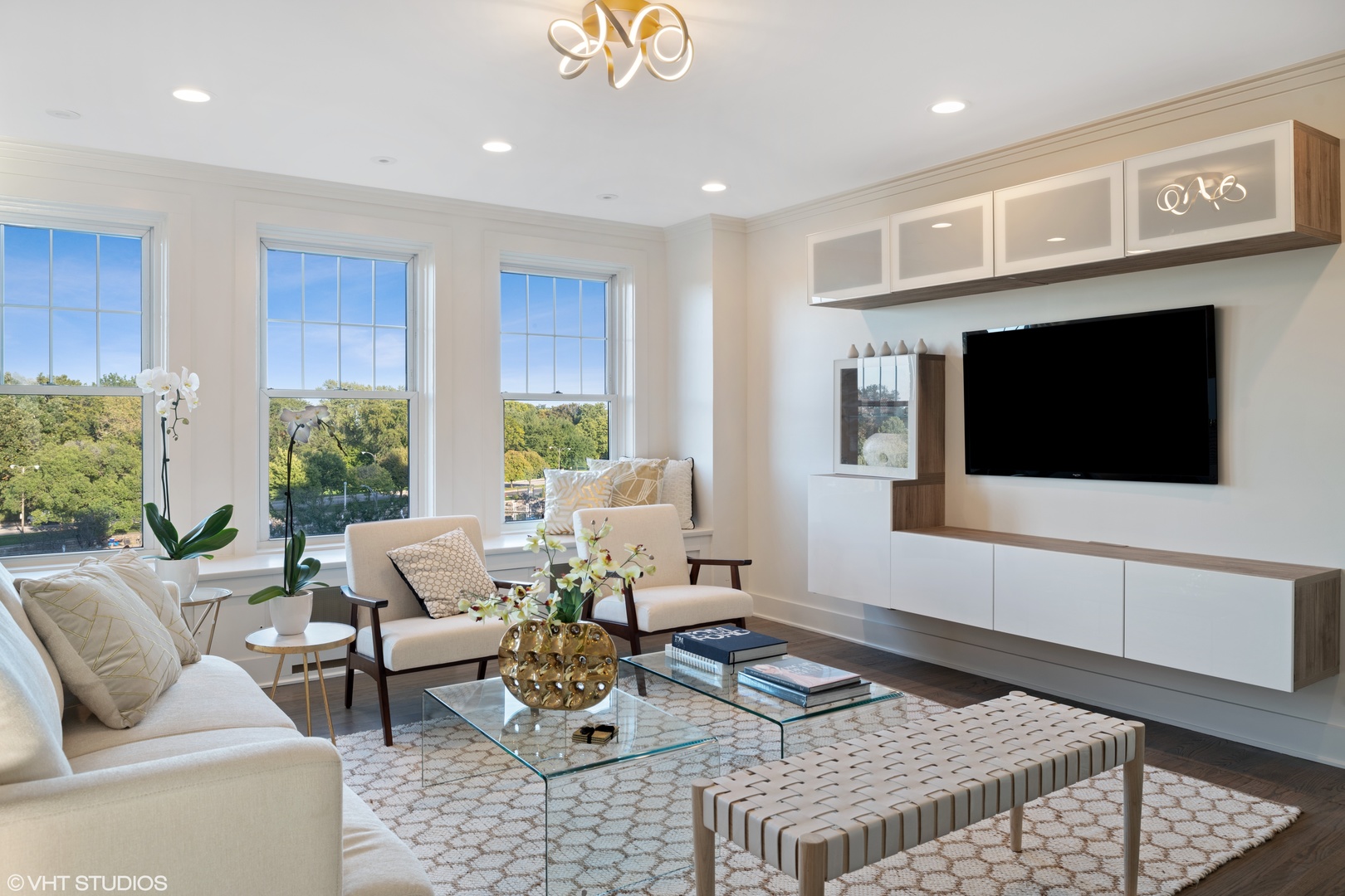 Undisclosed Address Chicago, IL 60657 - Photo 5 of 17 a living room with furniture and a flat screen tv