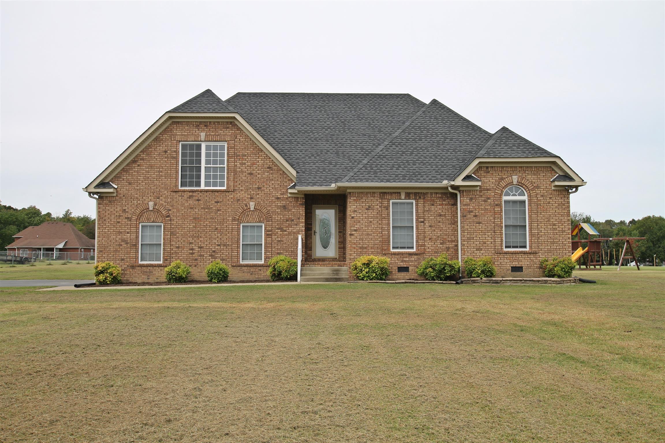 1012 Loganview Way Springfield, TN 37172 - Photo 1 of 30 a front view of a house with a yard