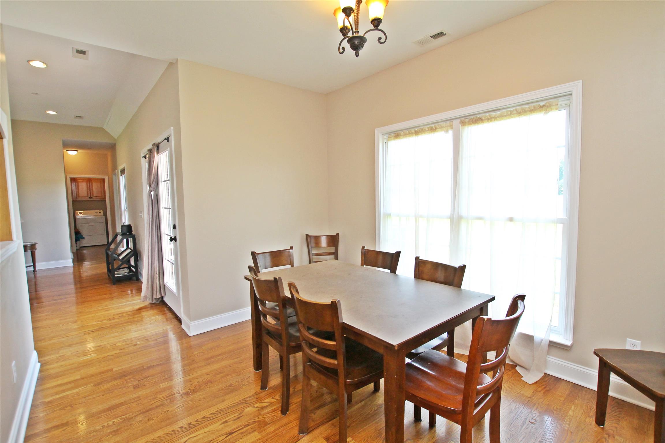 1012 Loganview Way Springfield, TN 37172 - Photo 12 of 30 a view of a dining room with furniture and wooden floor